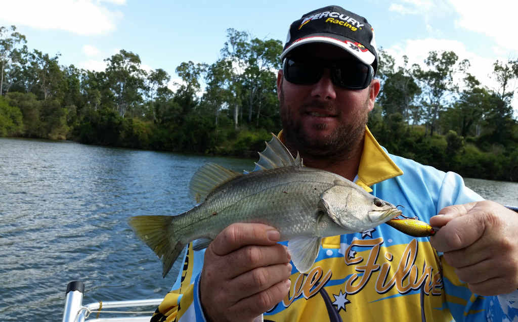 Fishing is pretty tough when the lures are as big as the target, as Fabian proves with this little winter barra. Fishing is pretty tough when the lures are as big as the target, as Fabian proves with this little winter barra.